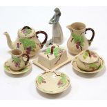 Eight items of Wade “Bramble” pattern tea ware; a set of three Bursley blue & white “Camille”