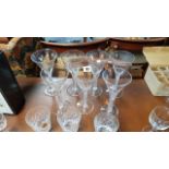 A set of seven wine glasses, each with spiral-twist stem & on round pedestal foot, 8¼” high; a set