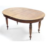 A VICTORIAN MAHOGANY EXTENDING DINING TABLE with D-shaped ends, two additional leaves, pull-out