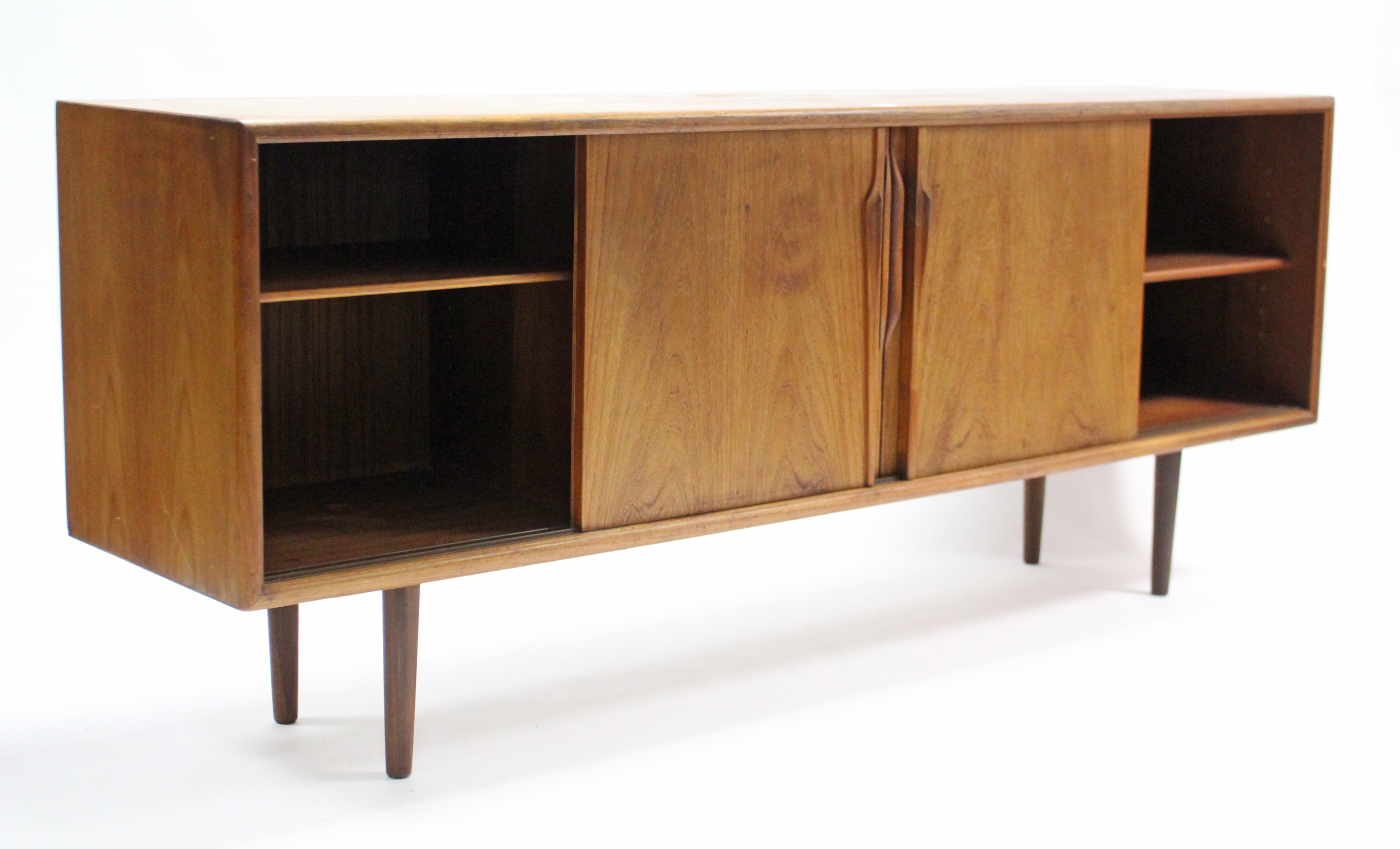 A 1960’s teak sideboard with fitted interior enclosed by two pairs of sliding panel doors, & on - Image 5 of 7