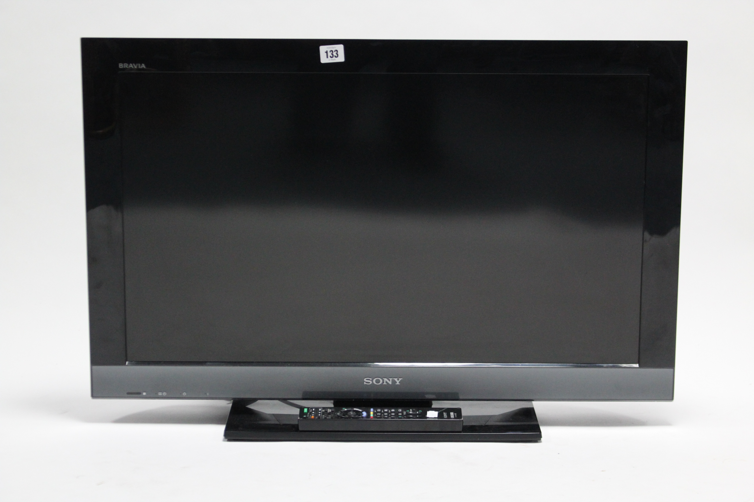 A Sony Bravia 31” LCD television with remote control.