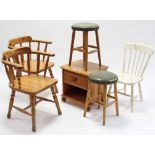 A pine bedside cabinet, 18” wide; together with a pair of dining chairs; a white painted spindle