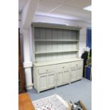A light grey painted reclaimed pine dresser, the upper part fitted two open shelves & with
