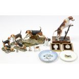 A Royal Copenhagen collector’s plate, decorated with a beagle & a gnome; a Royal Doulton beagle