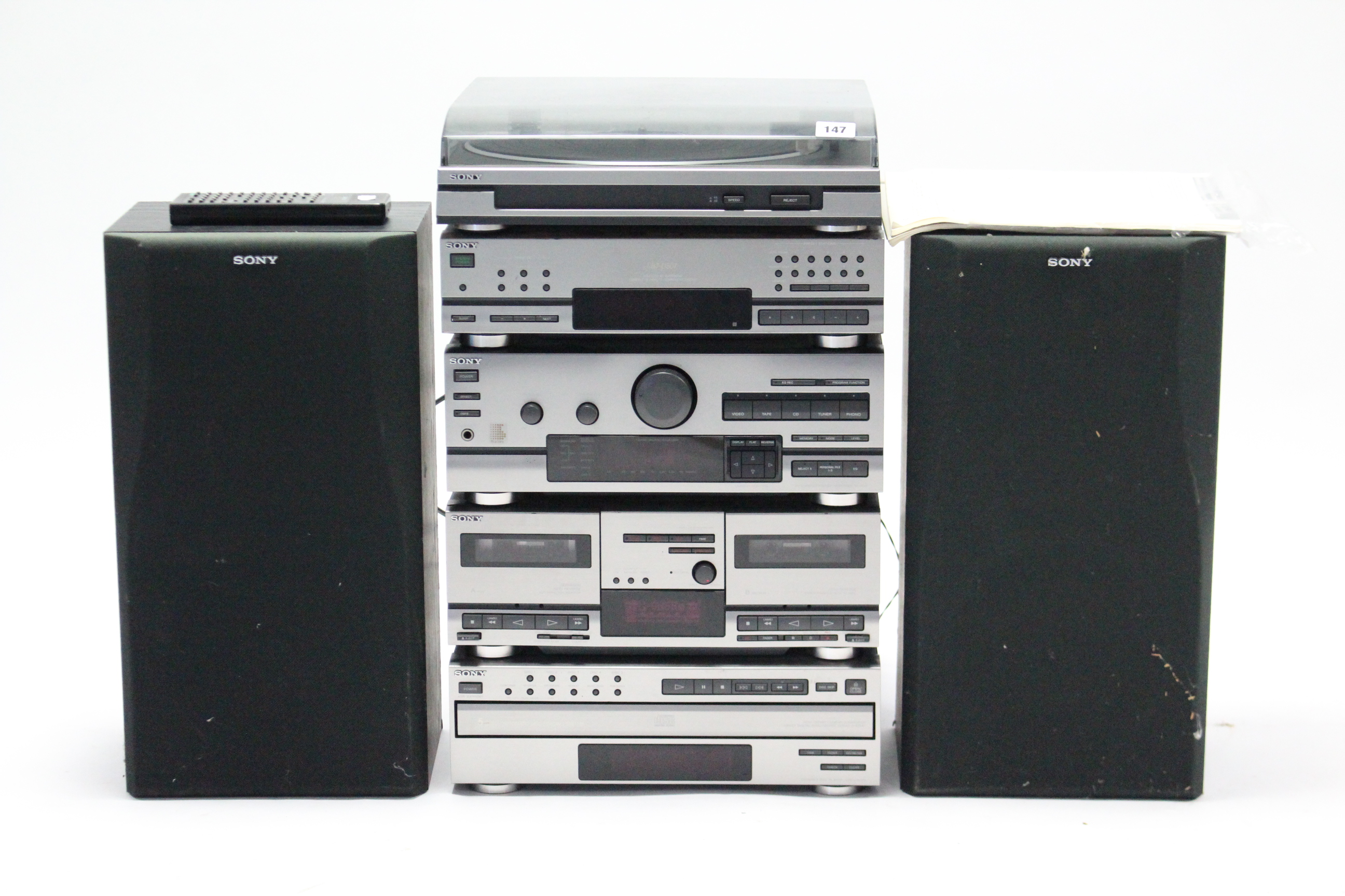 A Sony stacking stereo system; & various records.