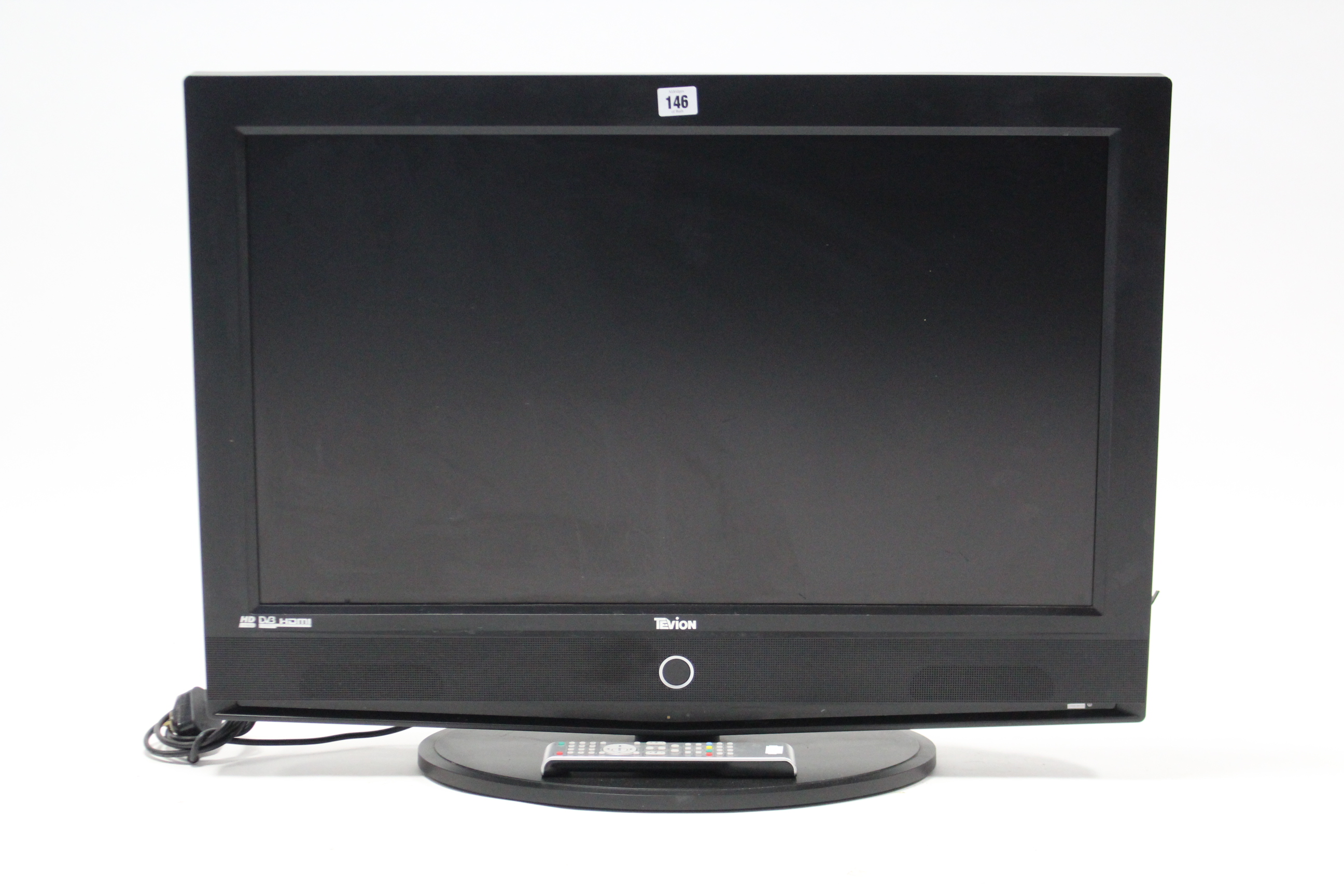 A Tevion LCD 31” television with remote control.