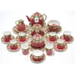 A Royal Worcester floral decorated thirty-one piece part tea & coffee service.