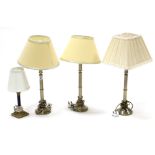 Four brass table lamps with shades; & various decorative pictures.