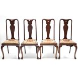 A set of four Queen Anne-style mahogany splat-back dining chairs with padded drop-in-seats, & on