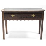 An oak side table, fitted long frieze drawer & on square chamfered legs, 35½” wide