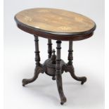 A mid-Victorian marquetry-inlaid oval occasional table, on four ring-turned tapered supports &
