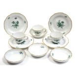 A Meissen porcelain twelve piece part tea service (settings for four), with green floral