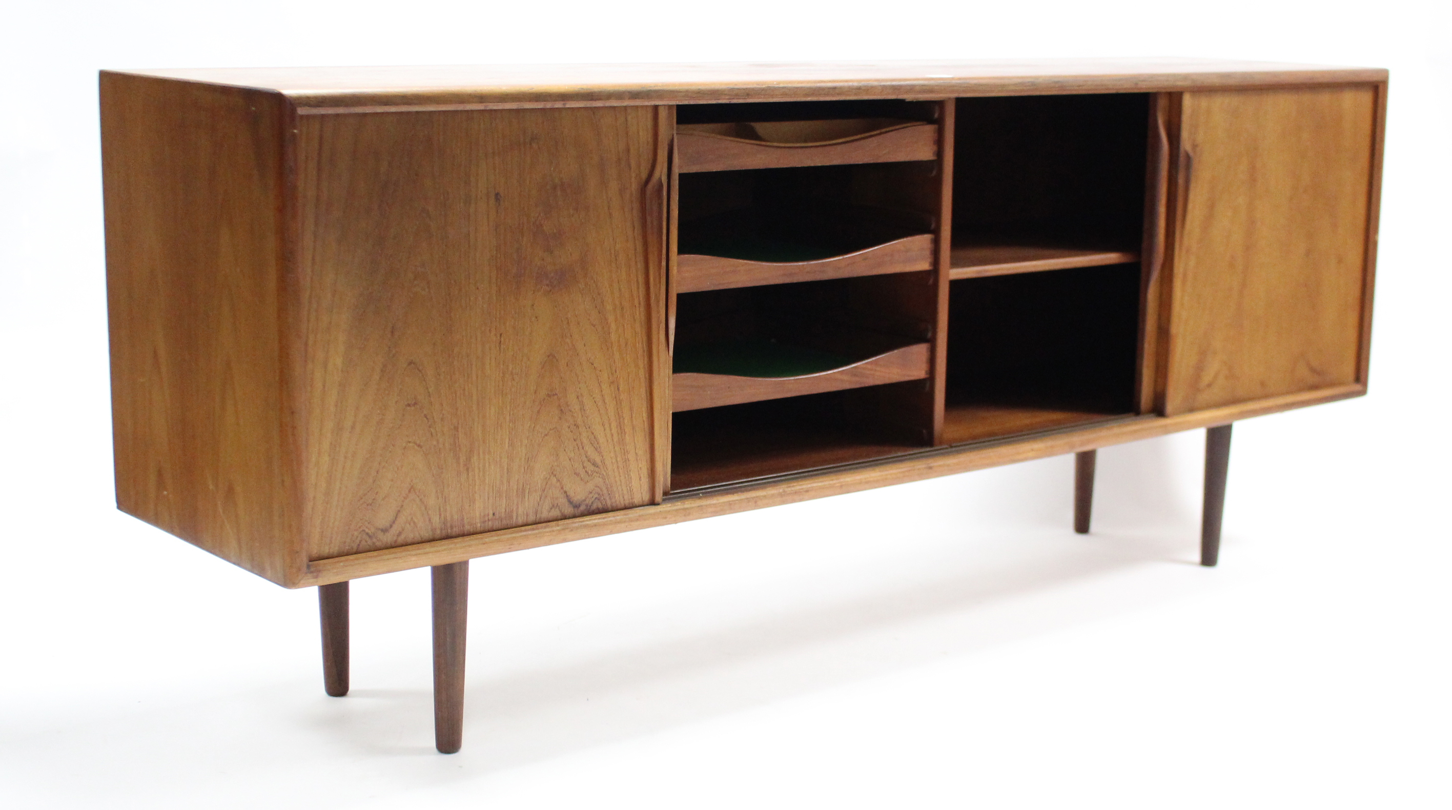 A 1960’s teak sideboard with fitted interior enclosed by two pairs of sliding panel doors, & on - Image 3 of 7