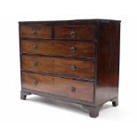 A 19th century small chest, fitted two short & three long graduated drawers with brass ring handles,