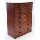 A Victorian stained pine tall chest, fitted two short & six long graduated drawers with turned