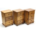 A set of three pine three-drawer bedside chests, 17” wide.