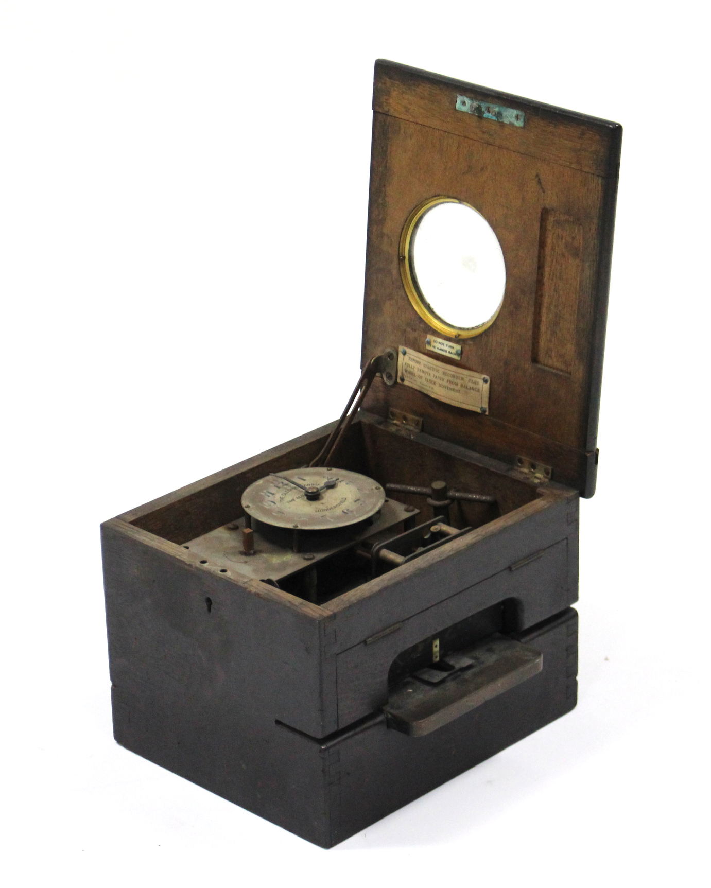 A Gledhill-Brook of Huddersfield time-recorder clock in ebonised oak case, 11¾” wide.