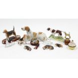 A Beswick beagle ornament mounted on wooden plinth; together with twelve various other dog