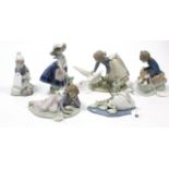 A Lladro Daisa porcelain ornament in the form of a swan & four cygnets; together with five Lladro