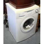 A Bendix 1200 r.p.m. washing machine in white finish case.