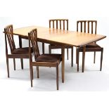 A Meredew teak extending dining table with centre leaf, & on round tapered legs, 33” x 72” (