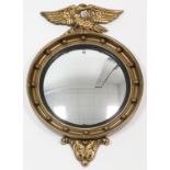 A 19th century-style gilt frame convex wall mirror with eagle surmount, & with sphere border, 18¼”