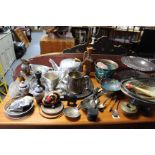 A silver plated oval cake basket; a silver plated oval entrée dish; & various other items of