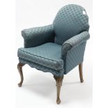 An early/mid-20th century easy chair upholstered blue material; & on short carved cabriole legs &