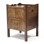 A George III inlaid-mahogany converted bedside commode with shaped tray-top, enclosed by pair of