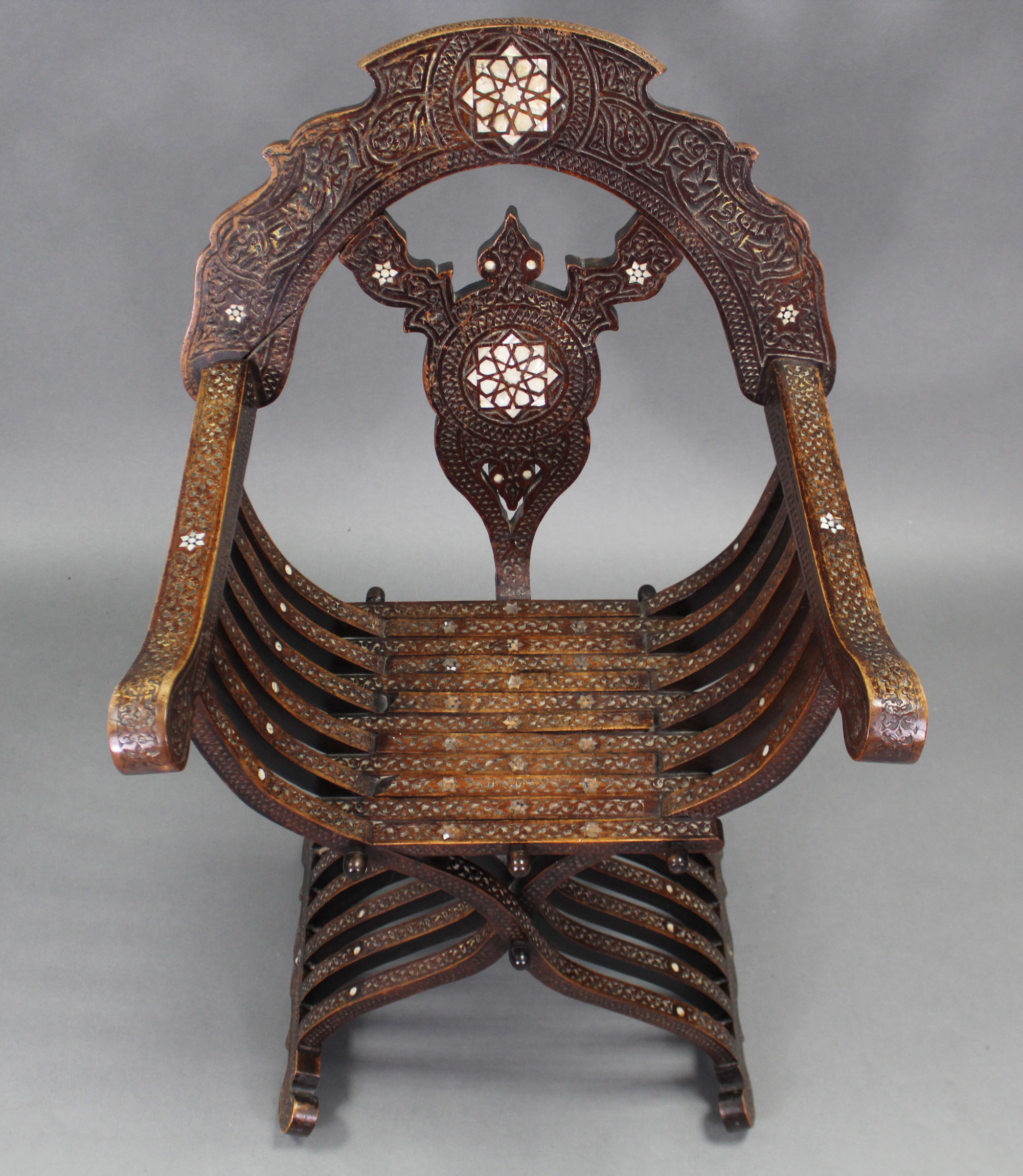 A late 19th/early 20th century carved walnut & mother-of-pearl inlaid Savonarola chair, with pierced - Image 3 of 3