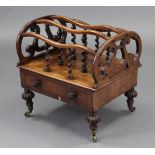 An early Victorian rosewood canterbury of three divisions with barley-twist supports & pierced