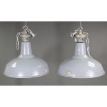 A pair of mid-20th century Benjamin industrial pendant ceiling lights with blue/grey enamel