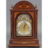 A LATE VICTORIAN LARGE CHIMING BRACKET CLOCK in marquetry decorated mahogany dome-top case, the 8”