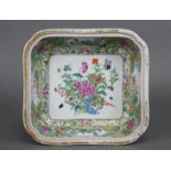 A 19th century Cantonese porcelain square dish decorated in famille rose enamels with a bouquet of