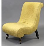 A Victorian nursing chair of scroll shape, upholstered yellow silk with repeating floral motif, on