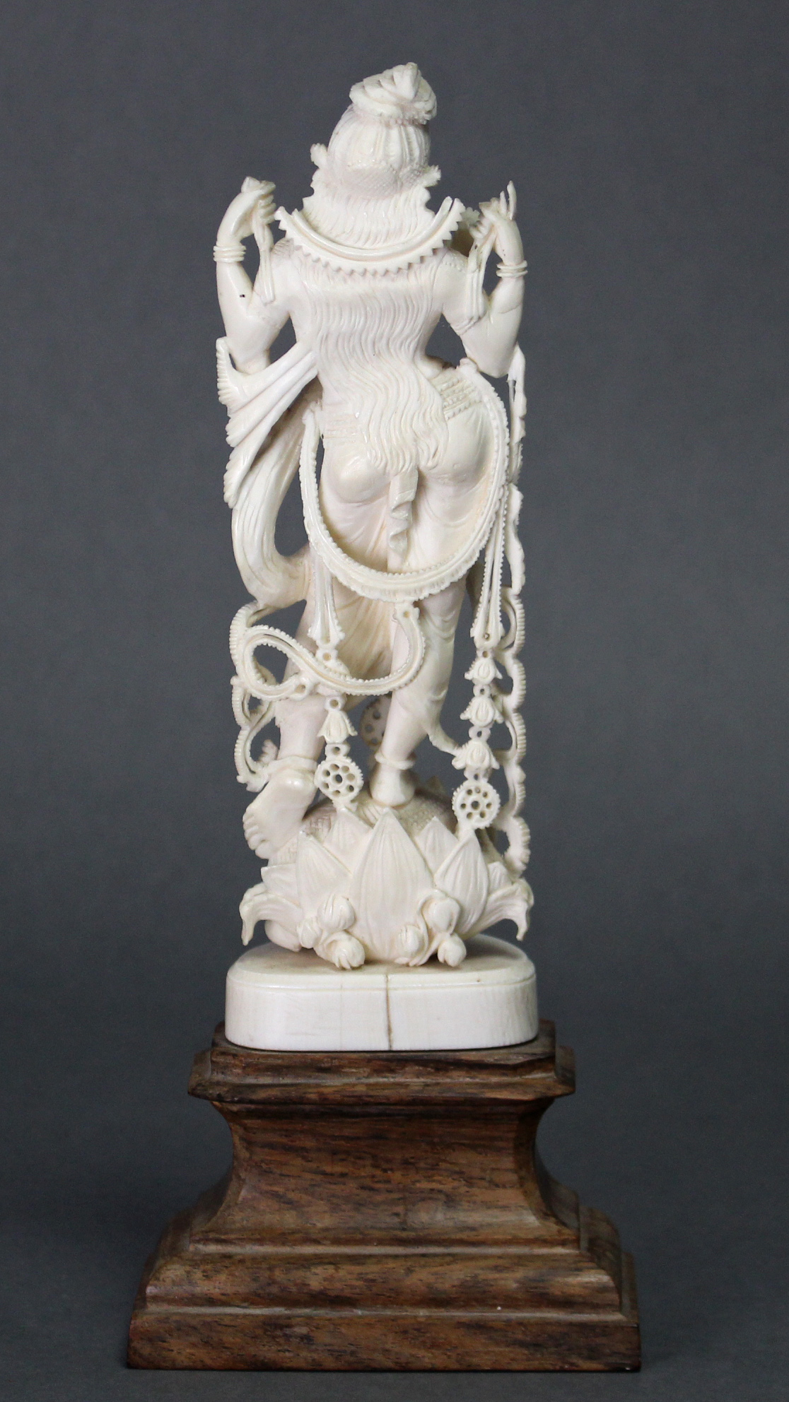 A 19th century ivory model of the goddess Laxmi, on wooden plinth base; 9“ high. - Image 3 of 4