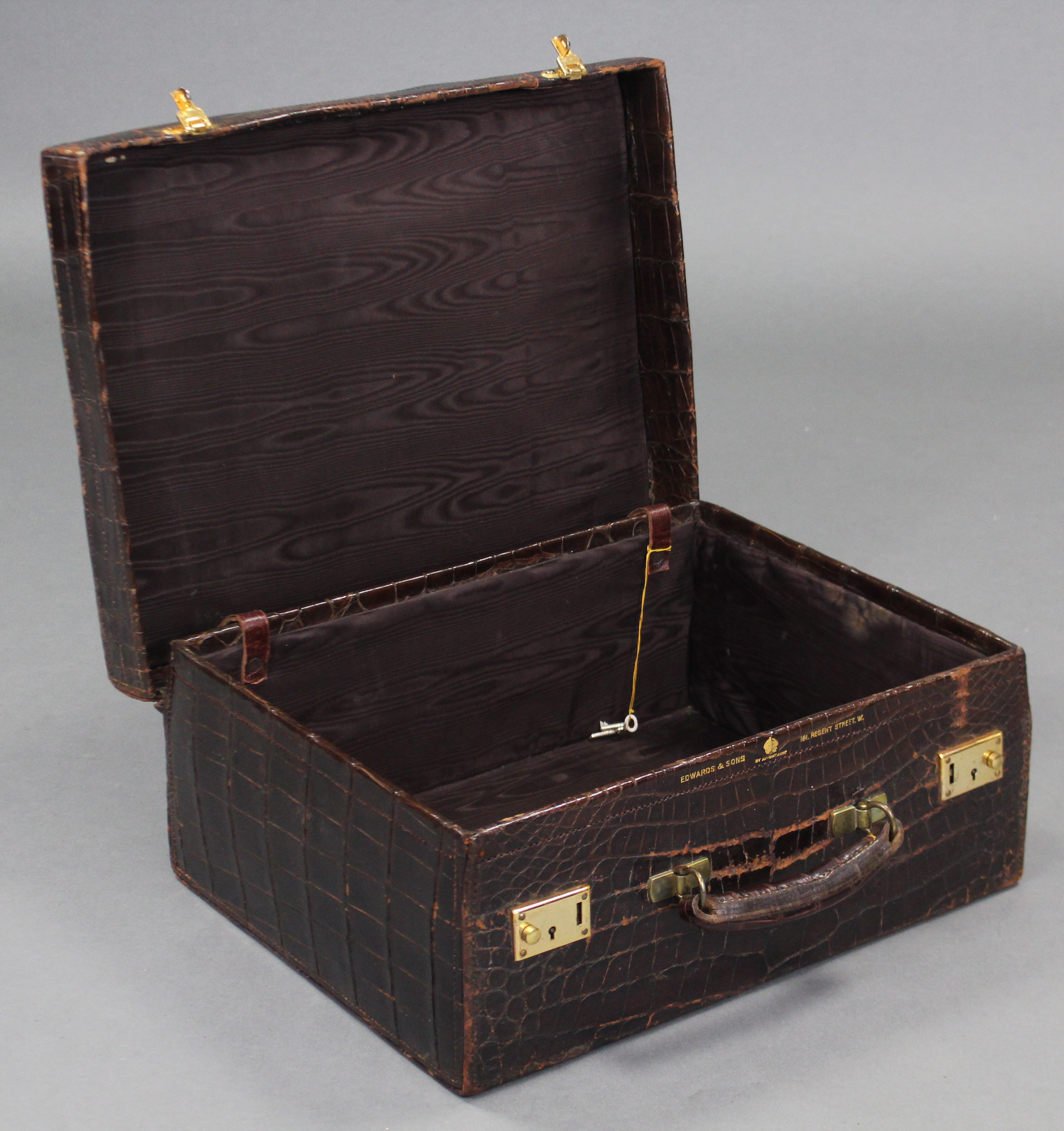 A brown crocodile skin suitcase with gilt-brass twin locks, retailed by Edwards & Sons, Regent - Image 2 of 2