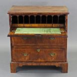 A GEORGE II FIGURED WALNUT SECRETAIRE CHEST of small proportions, the quarter-veneered &
