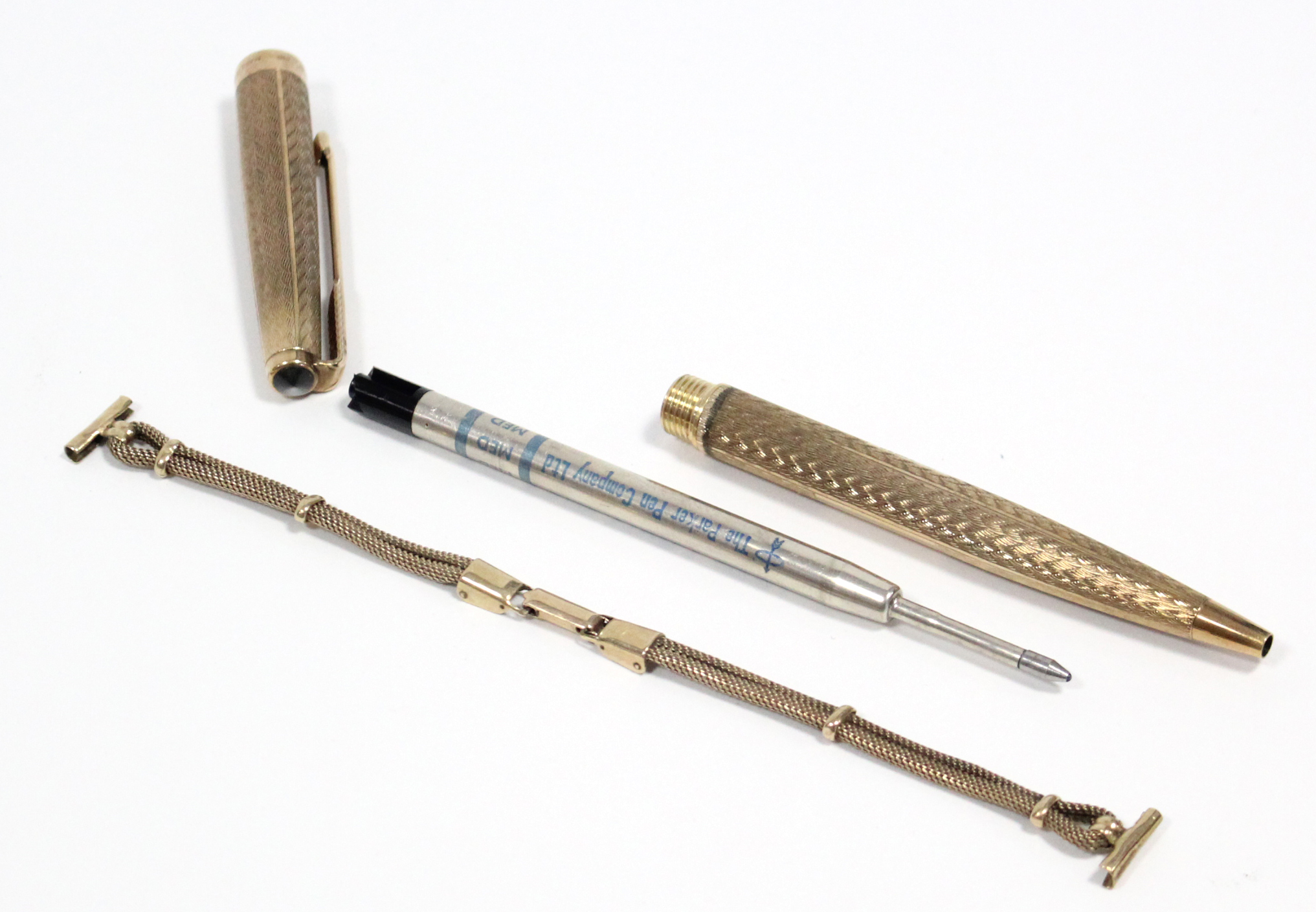 A Parker ball point pen in 9ct. gold case with engine-turned decoration, hallmarks for London 1968; - Image 4 of 4