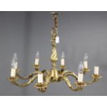 A modern heavy cast-brass ceiling light fitting on slender spiral-twist column; 28” wide x 16½”