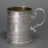 A Victorian silver cylindrical christening mug with beaded scroll handle & raised bands of stars &
