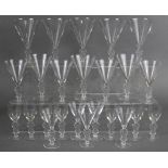 A PART-SUITE OF LALIQUE DRINKING GLASSES, comprising: five 6” trumpet-shaped wine glasses; three