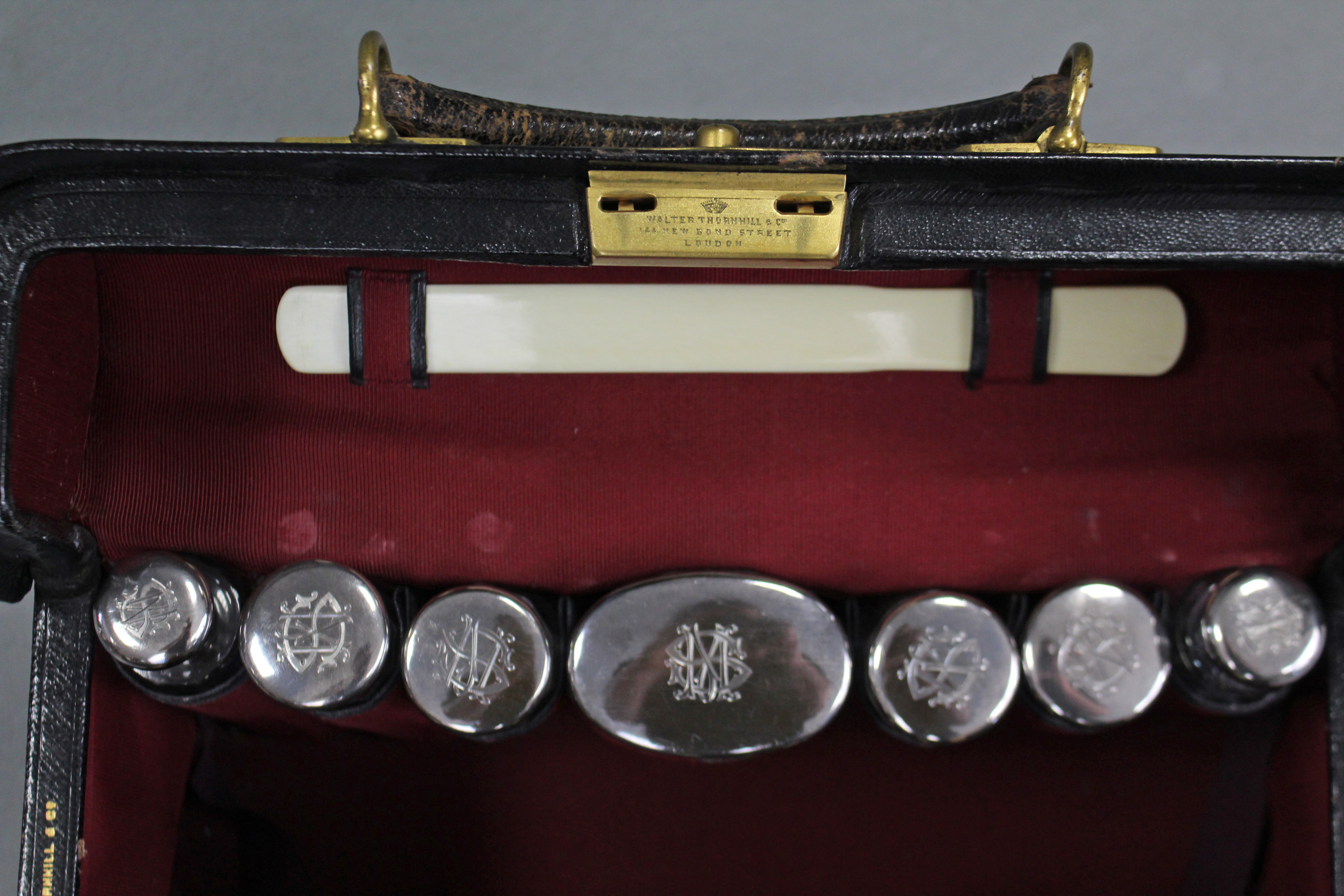 A late Victorian gentleman’s black leather travelling toilet case by W. Thornhill of New Bond St., - Image 5 of 7