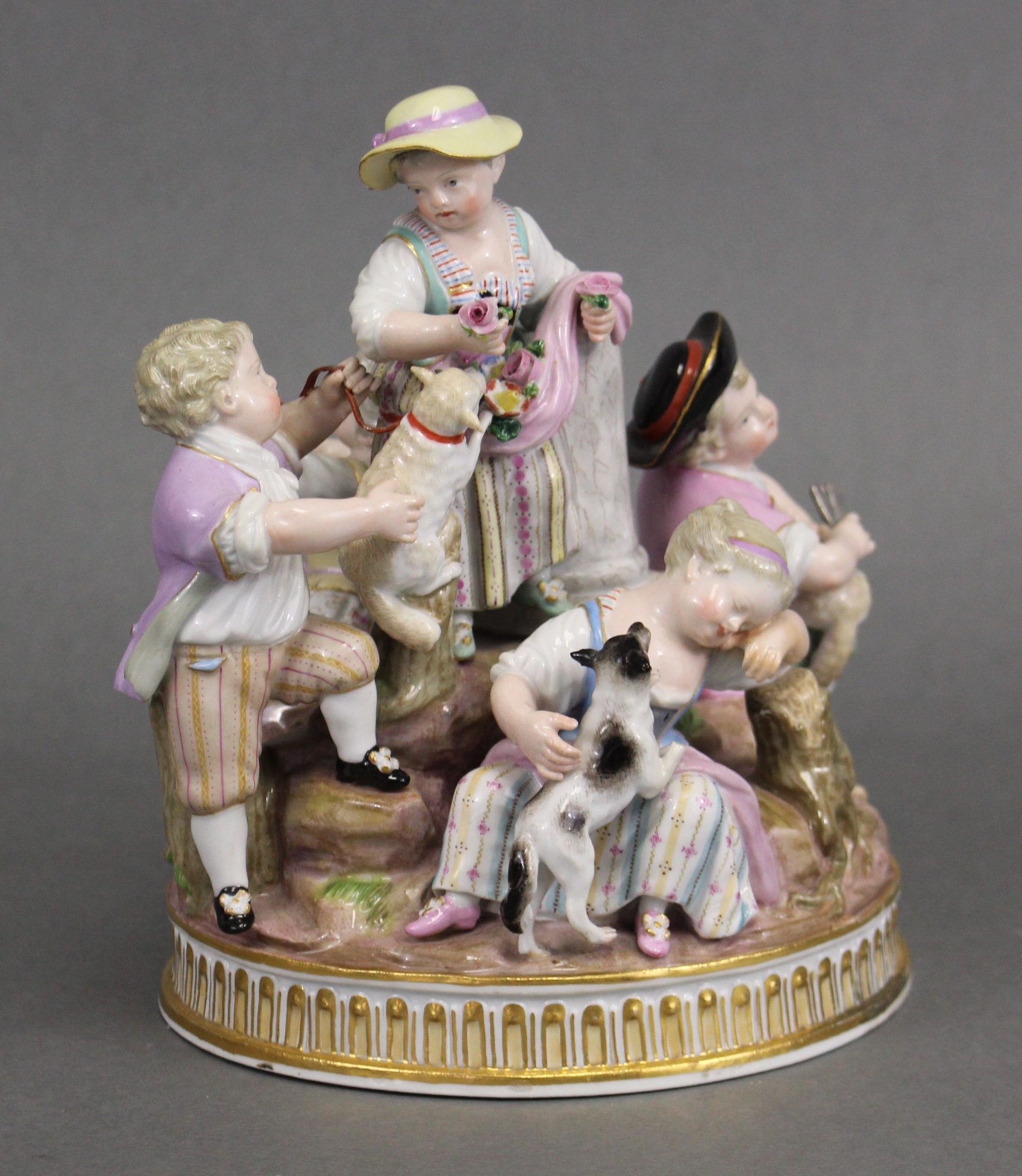 A MEISSEN PASTORAL GROUP of three female & two male figures about a central truncated column, one - Image 2 of 5