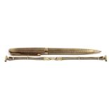 A Parker ball point pen in 9ct. gold case with engine-turned decoration, hallmarks for London 1968;