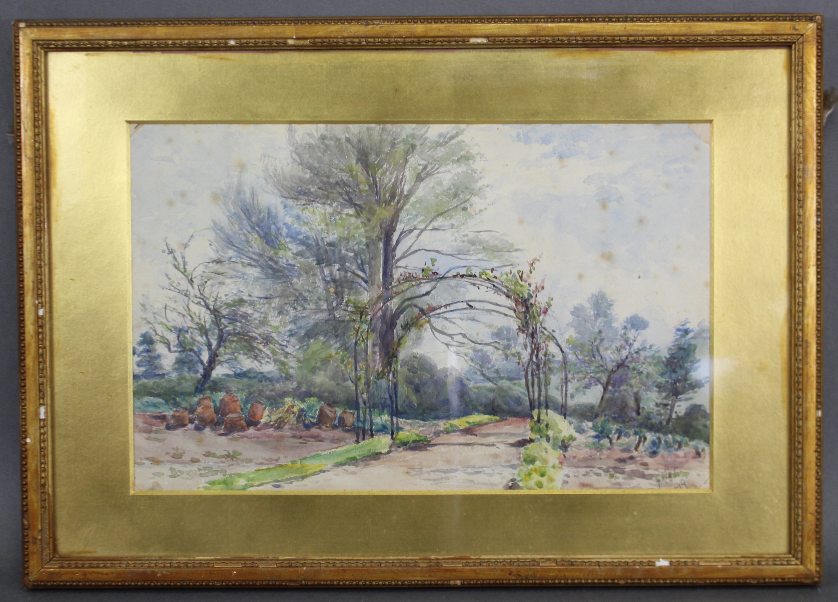 ENGLISH SCHOOL, 19th century. A rural landscape with willow arches, signed & dated “M.J.S. ‘99”