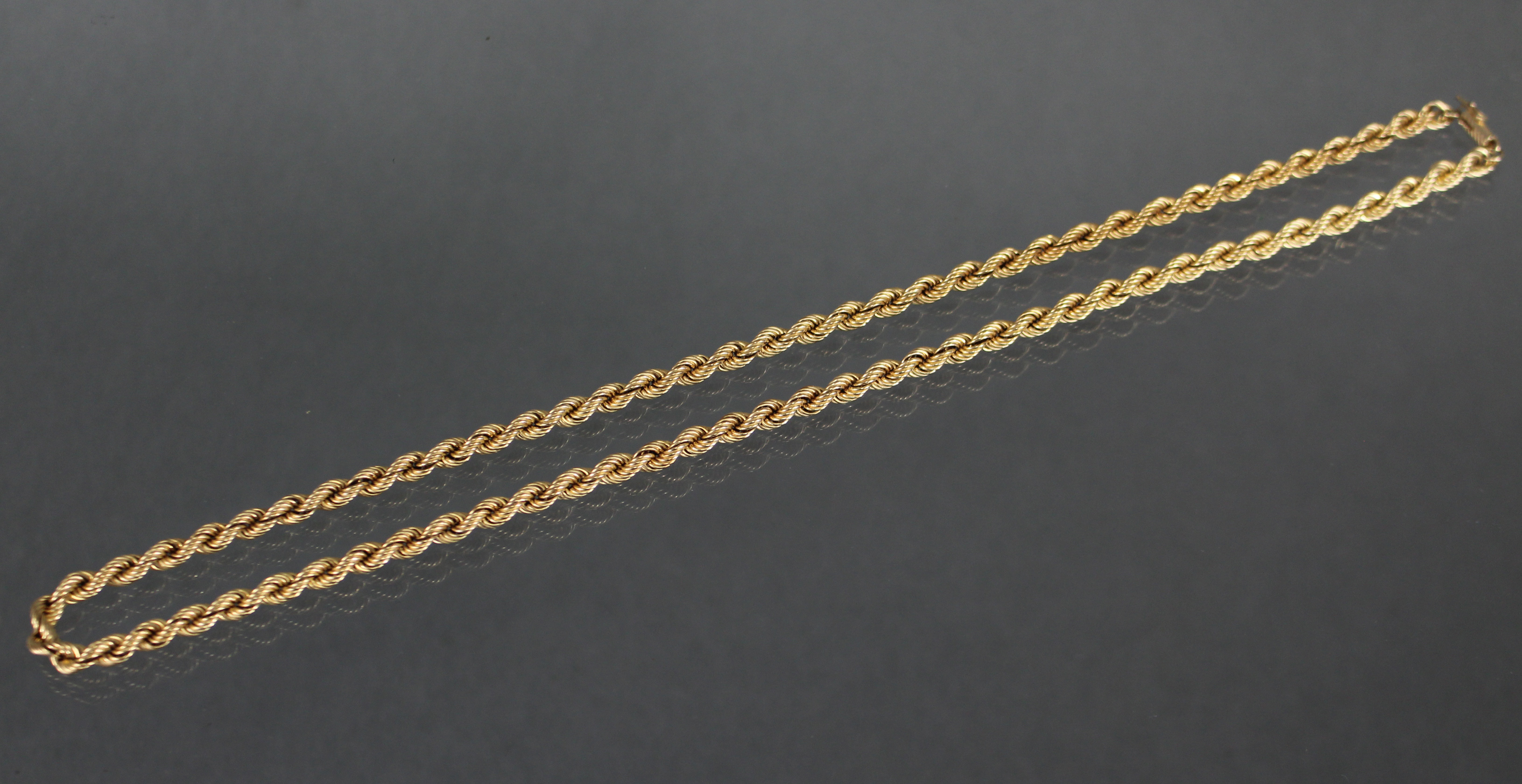 A 9ct. gold necklace of rope-twist design; 24” long. (14.3gm). - Image 2 of 3