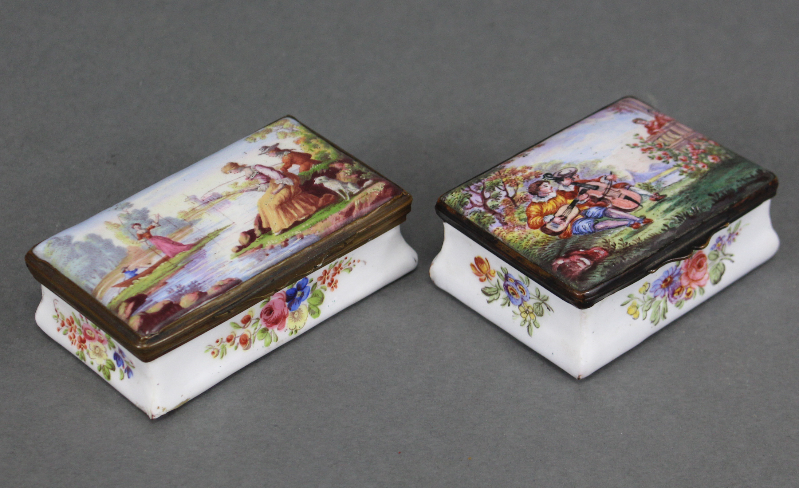 Two 19th century enamel rectangular boxes in the 18th century style, each with hinged lid & gilt-