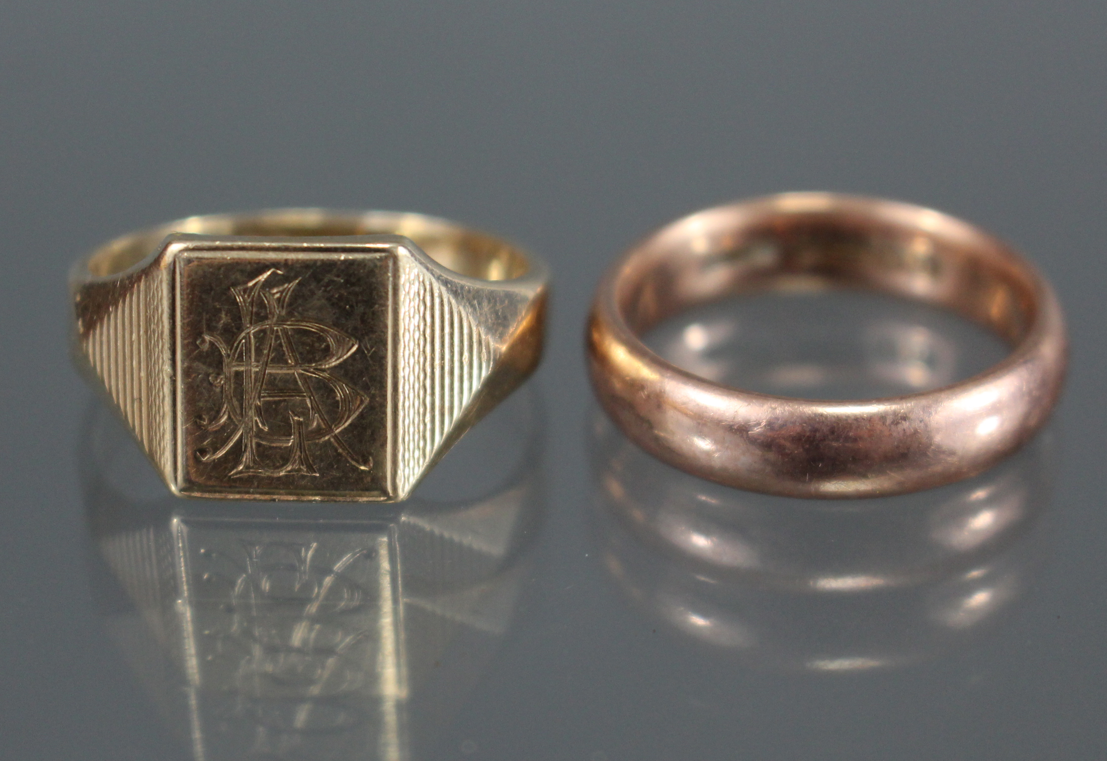 A 9ct. yellow gold signet ring, Birmingham hallmarks for 1987, (size: S; weight: 5gm); & a 9ct. rose