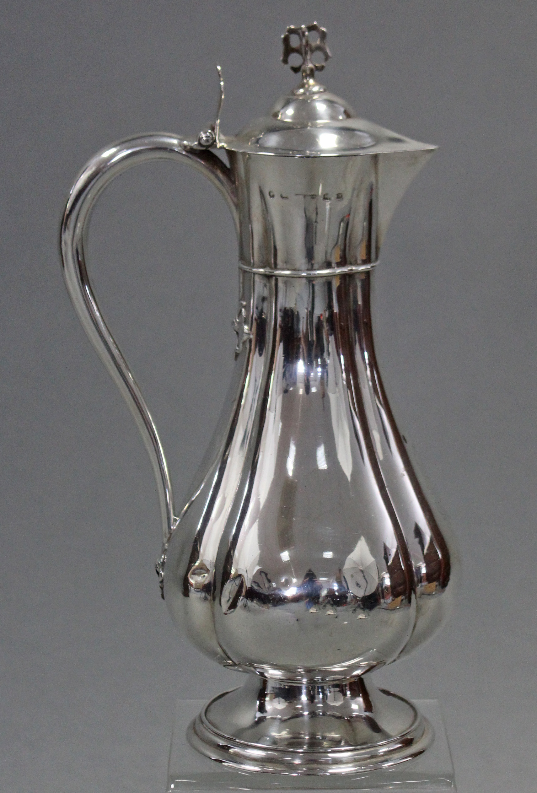 A Victorian silver communion wine flagon of fluted baluster form, with pierced finial & shaped - Image 2 of 3